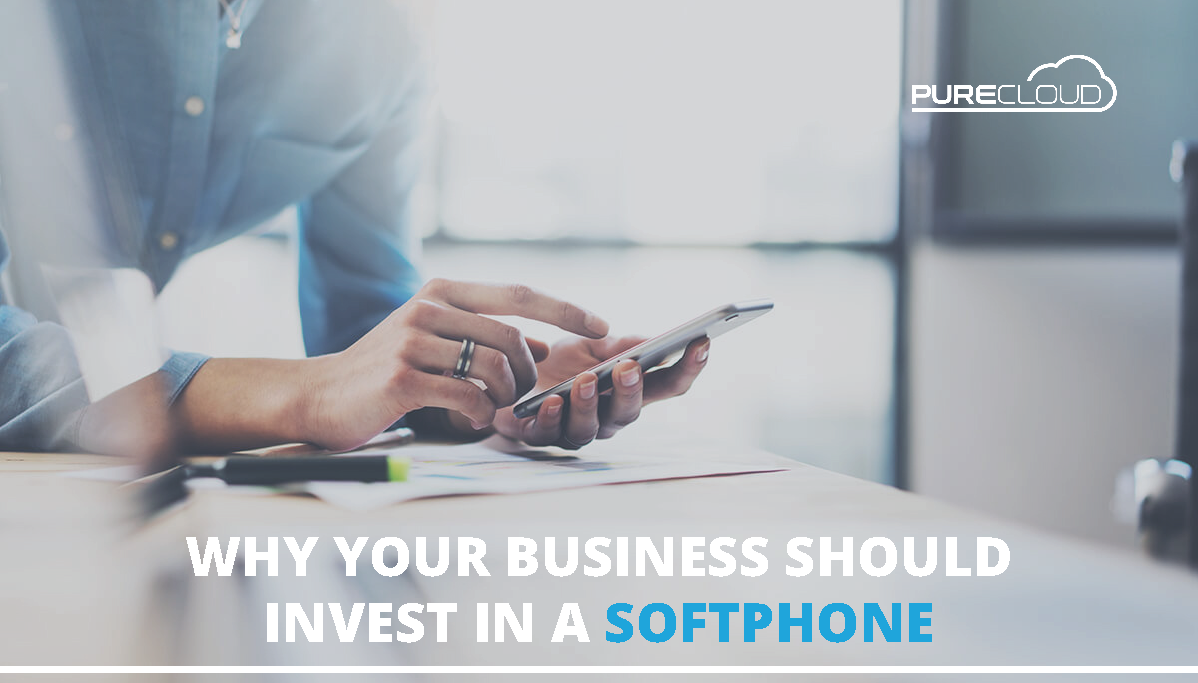 A person holding a smartphone while sitting at a desk with text that reads 'Why Your Business Should Invest in a Softphone'.